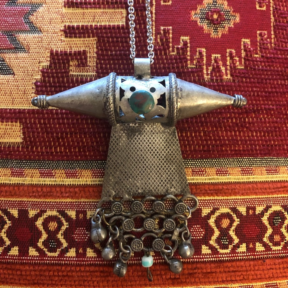 Long unique silver pendant with gemstone